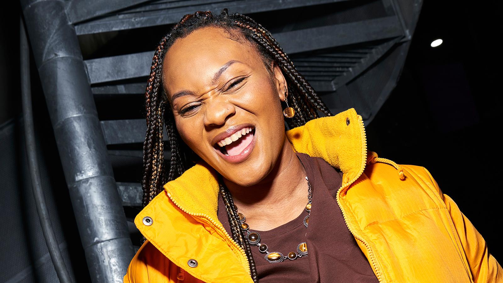 Student with a yellow jacket