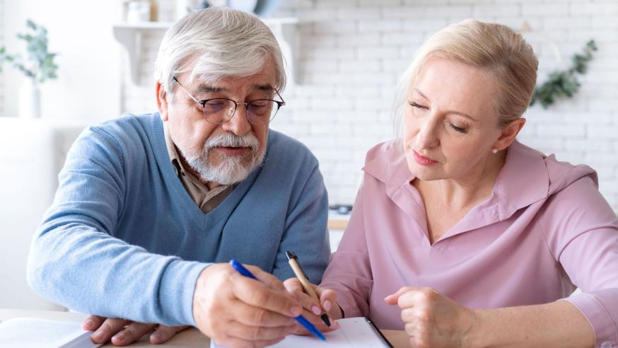 Senior couple learning