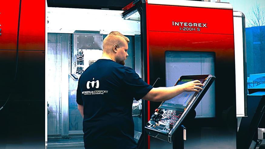 Student working with Mazak