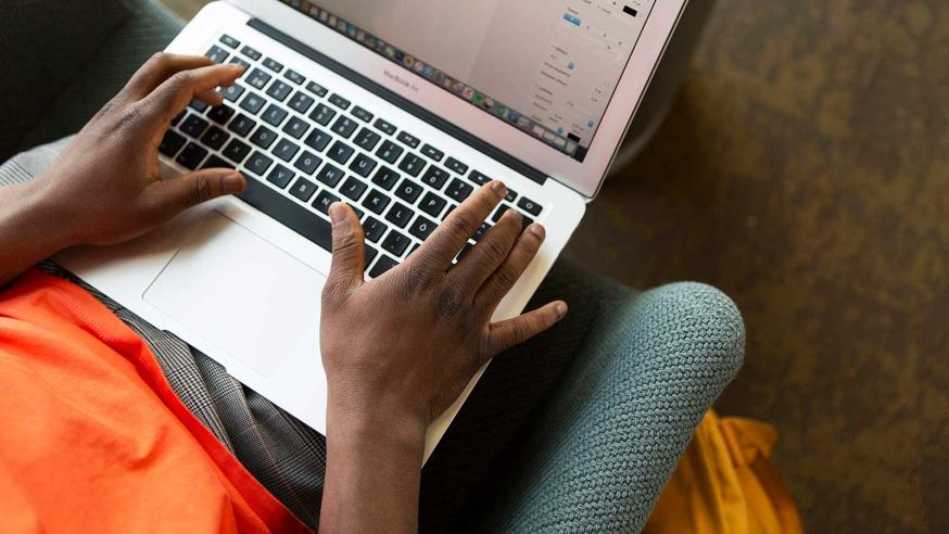 Student using a laptop.