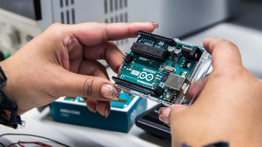 Students working in Electronics laboratory.