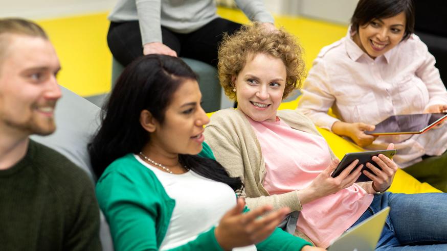 Group of students discussing.