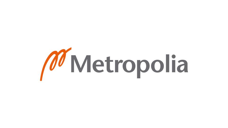 Metropolian oranssiharmaa tunnus.