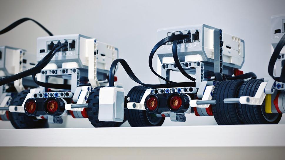 Lego robots on a shelf.