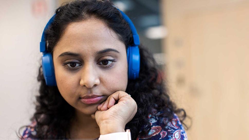 Student with headphones on.