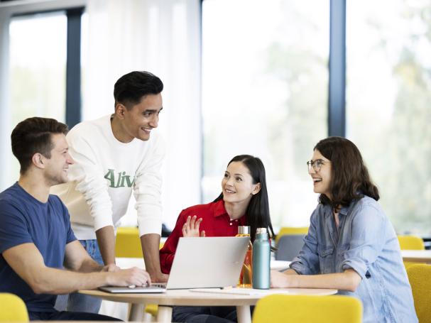 Students studying in front of a computer