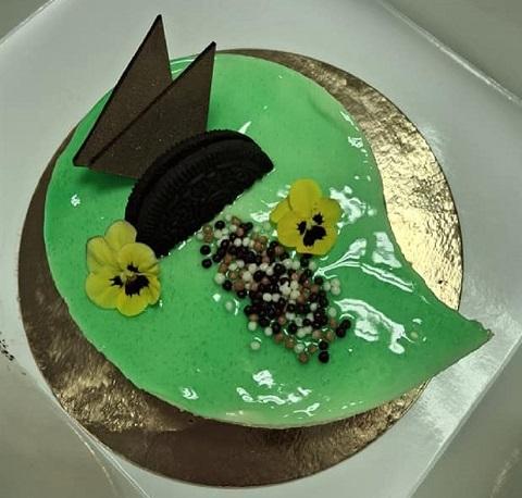 A cake baked by Bakery of Varia, where edible flowers grown in Urbanfarmlab are used as decorations