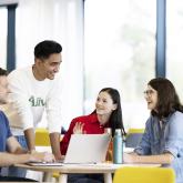 Students studying in front of a computer